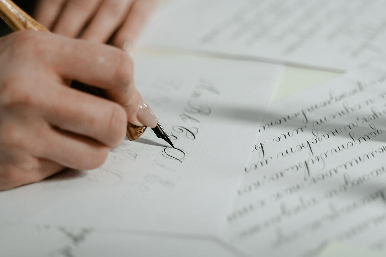 Hand writing signature letters