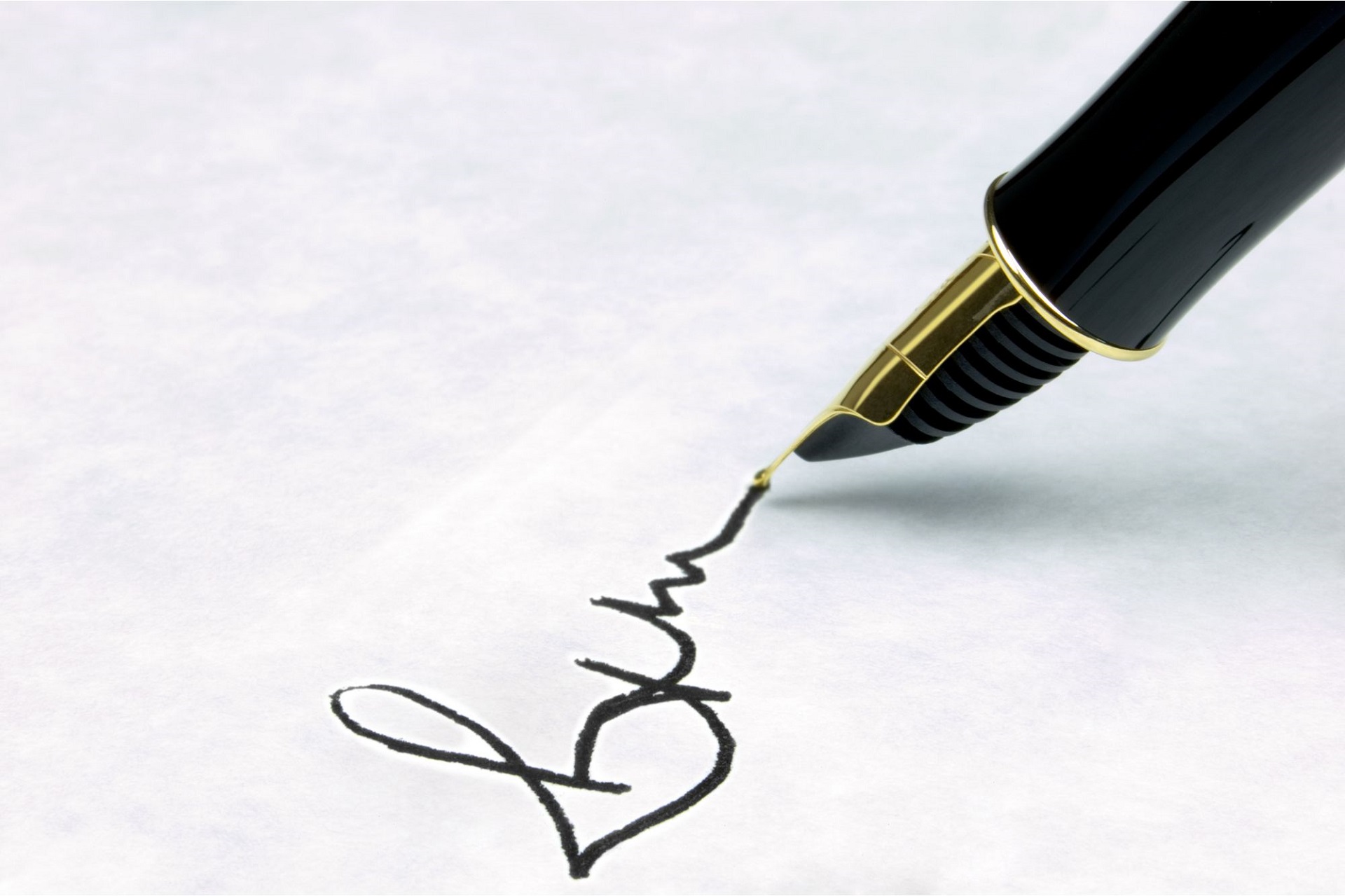 Written signature on paper